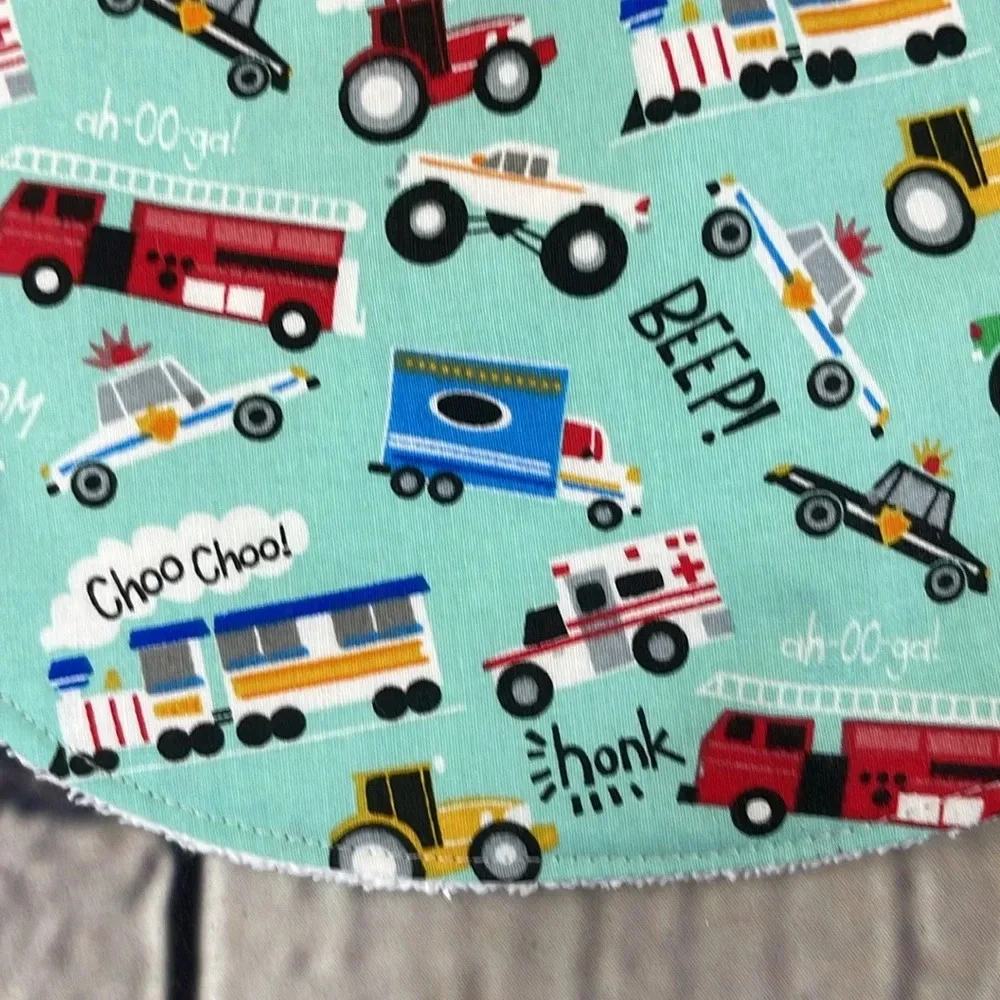 Designer handcrafted transportation bib